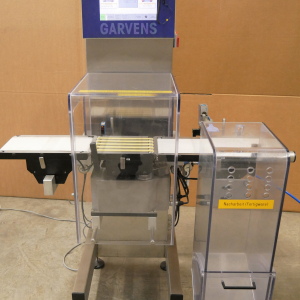 Garvens S2 inline checkweigher with reject device and reject container