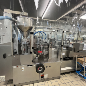 IWKA/Netzsch/Laetus/Mettler Toledo Garvens/Skinetta Kompletna linia do napełniania i pakowania tub stożkowych i aluminiowych, wydajność 180 tubek/min.