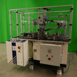 Sollas S20 automatic carton overwrapping machine with tear tape applicator and right-angled infeed belt